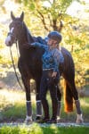 peacock technical long sleeve shirt front left with horse performa ride