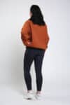 burnt chestnut crew neck sweater back left performa ride