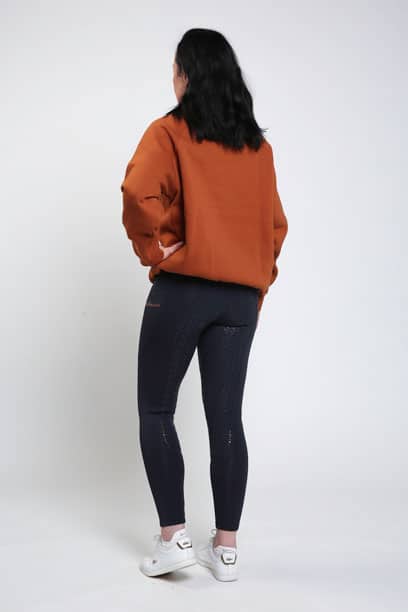 burnt chestnut crew neck sweater back left performa ride